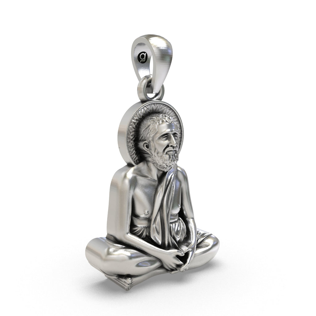 Describe the antique oxidized finish, handcrafted detail, lightweight feel, and traditional spiritual jewelry appeal.