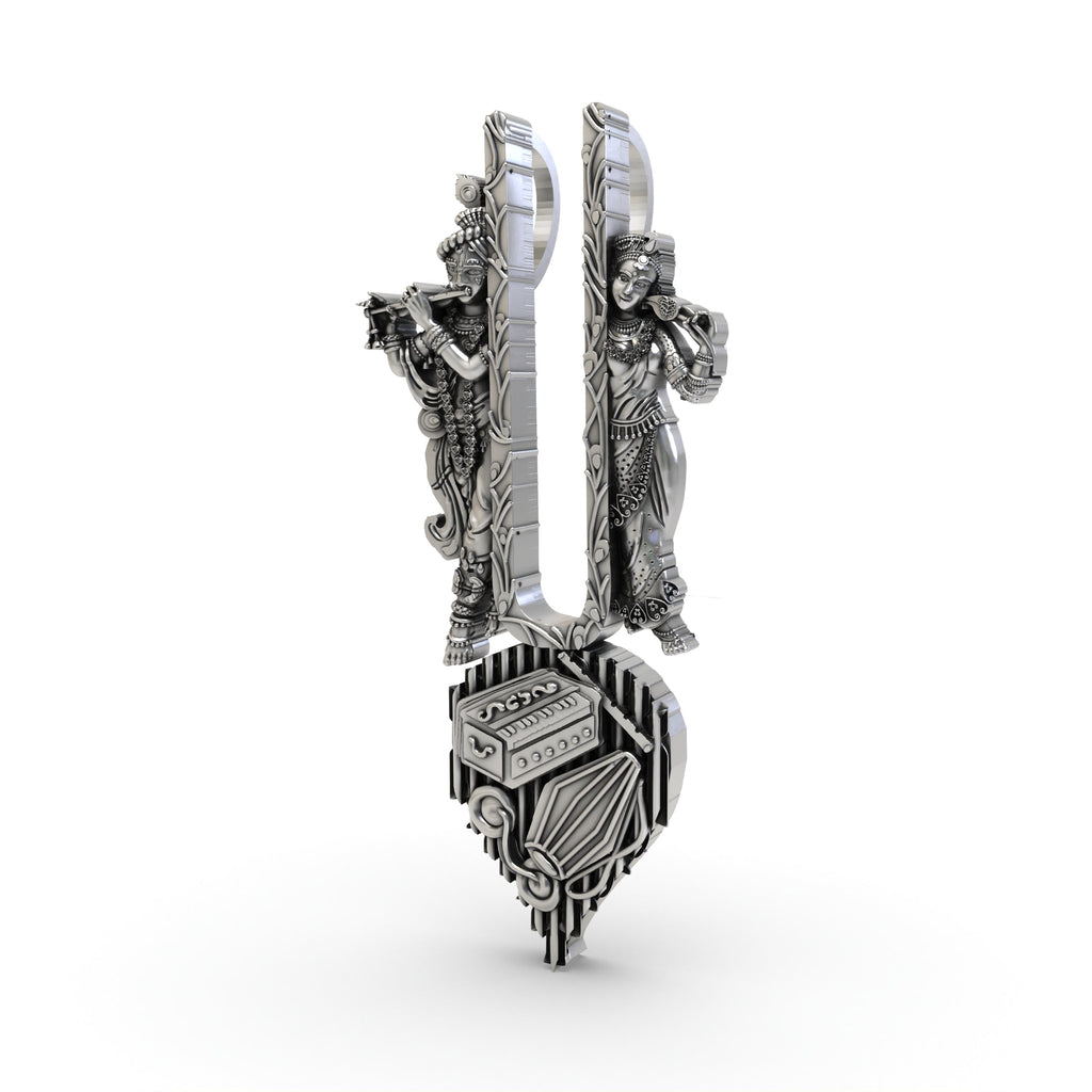 Angled profile of the Radha Krishna silver pendant, highlighting the detailed carvings and antique oxidized finish.