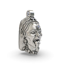 Side profile of the handcrafted 925 silver Kali Maa face pendant, showcasing its depth and hollow back design.