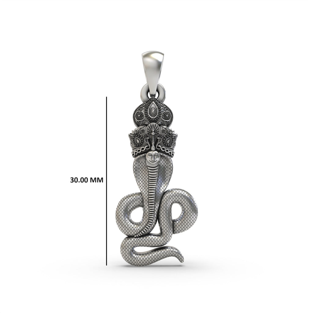The sterling silver Goga Maharaj pendant shown against a neutral background to display its size and oxidized sheen.