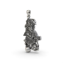 A close-up of the Kashtabhanjan Hanumanji silver pendant highlighting the divine features and oxidized finish.