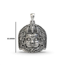 Studio product shot of the 925 silver Kaal Bhairav pendant, emphasizing its bold design and antique oxidized texture.