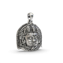 Close-up shot of the oxidized silver Kaal Bhairav pendant, focusing on the expressive features and traditional adornments.