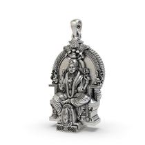 Angled profile of the oxidized Mariamman locket, highlighting its polished 925 silver craftsmanship and depth.