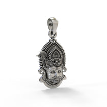 Close-up detail of the sterling silver Khatu Shyam God pendant, showing the antique oxidized texture and fine features.
