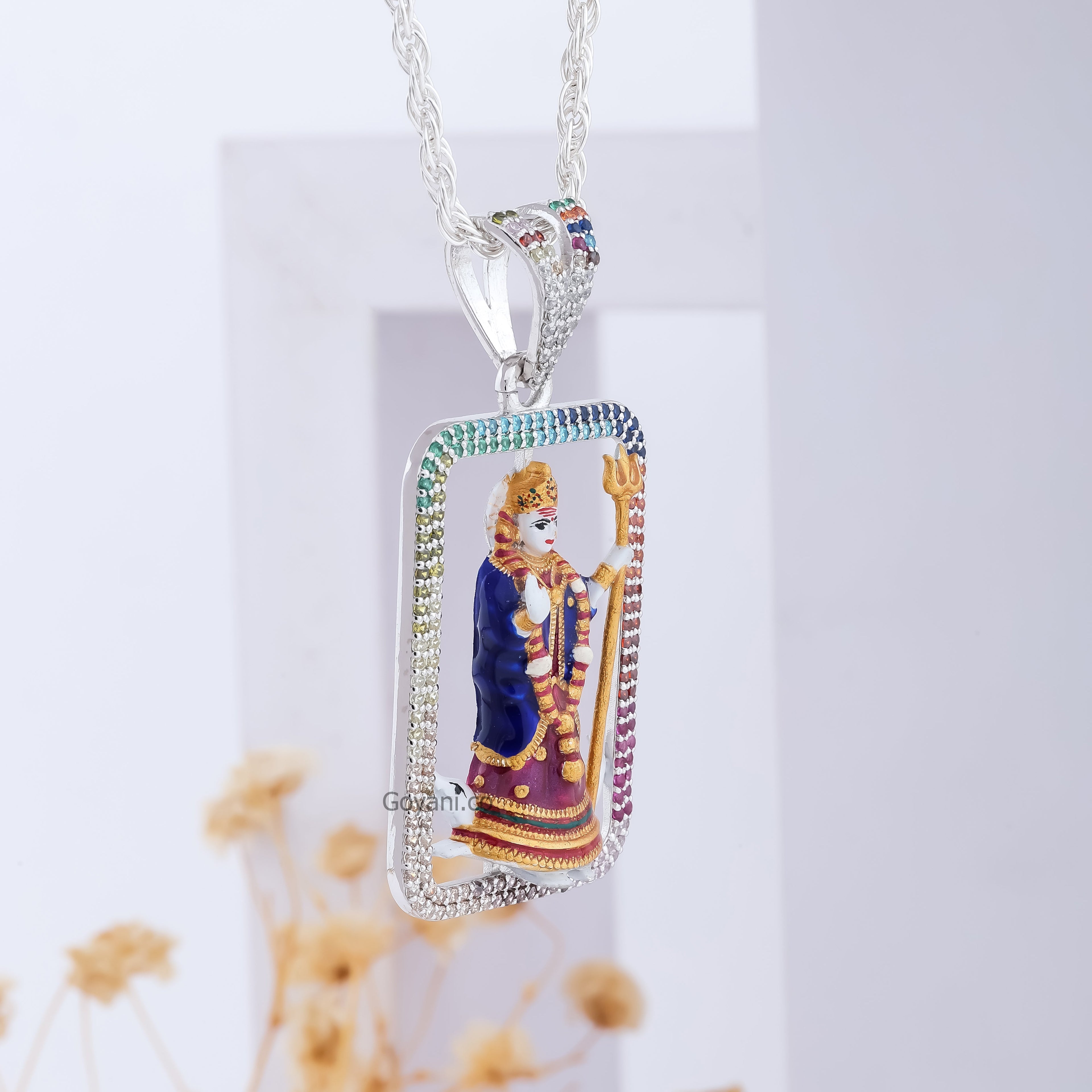 Close-up detail of the intricately crafted Khodiyar Maa pendant in high-polished sterling silver.