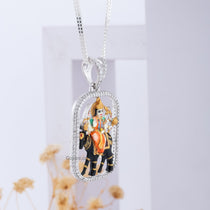 A close-up, angled shot of the Meldi Mata Diamond Pendant highlighting the brilliant-cut diamonds and polished silver.