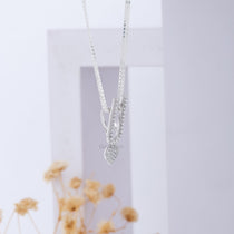 A side profile of the spiritual 925 sterling silver ISKCON Tilak Pendant, revealing its solid craftsmanship.