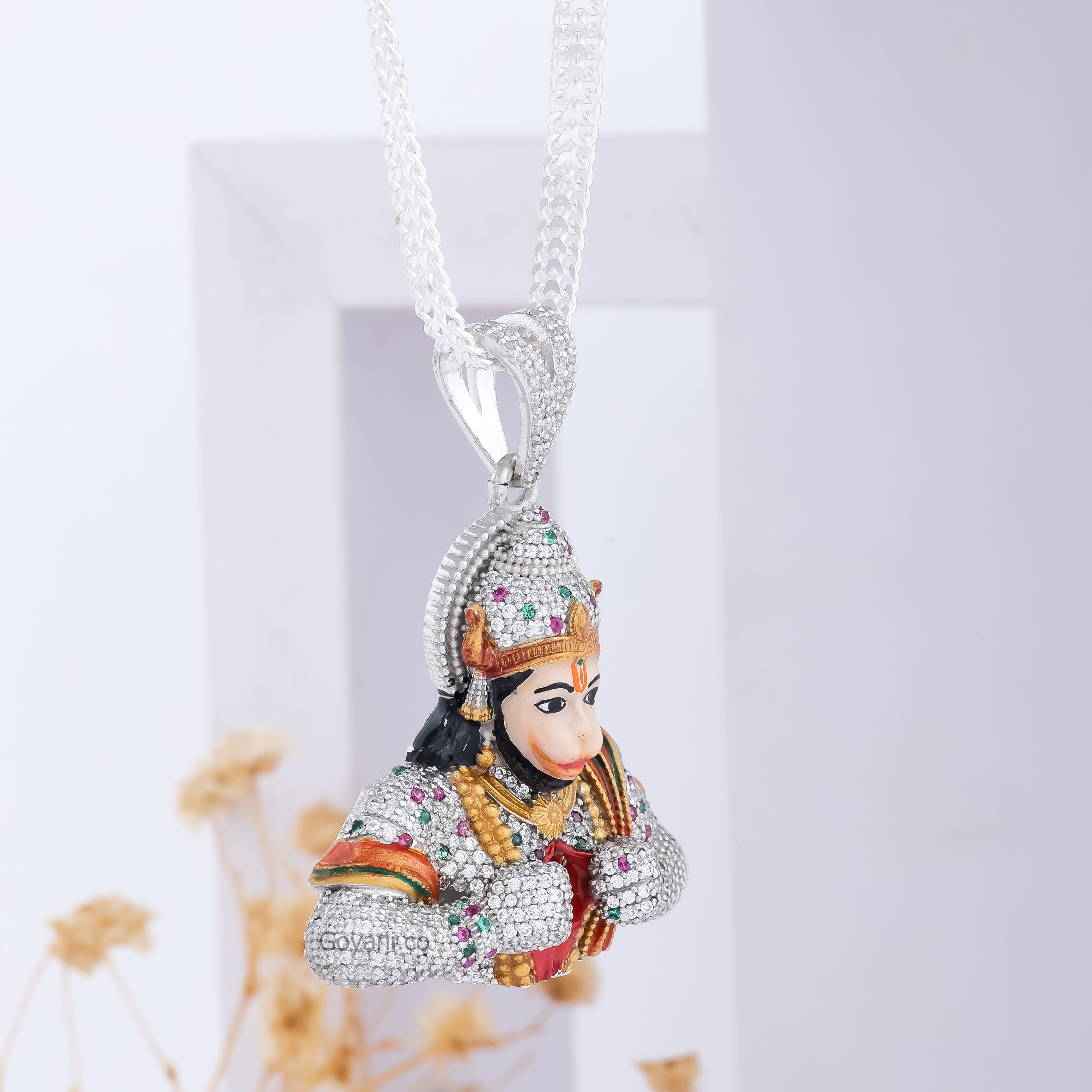Studio shot of the 925 silver Hanumanji pendant against a plain background, displaying its brilliant shine and detail.