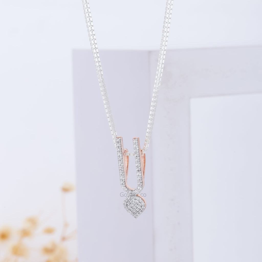 Close-up detail of the sparkling diamond accent on the pure 925 silver ISKCON Tilak Pendant by Alankar Jewelry.