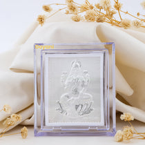 Front view of the 999 Silver Lakshmi Maa Stand, showcasing the intricate detailing of the goddess on a high-polished base.