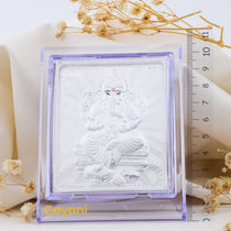 A close-up of the high-polished 999 silver Ganesha stand, highlighting the intricate details on the idol's face and trunk.