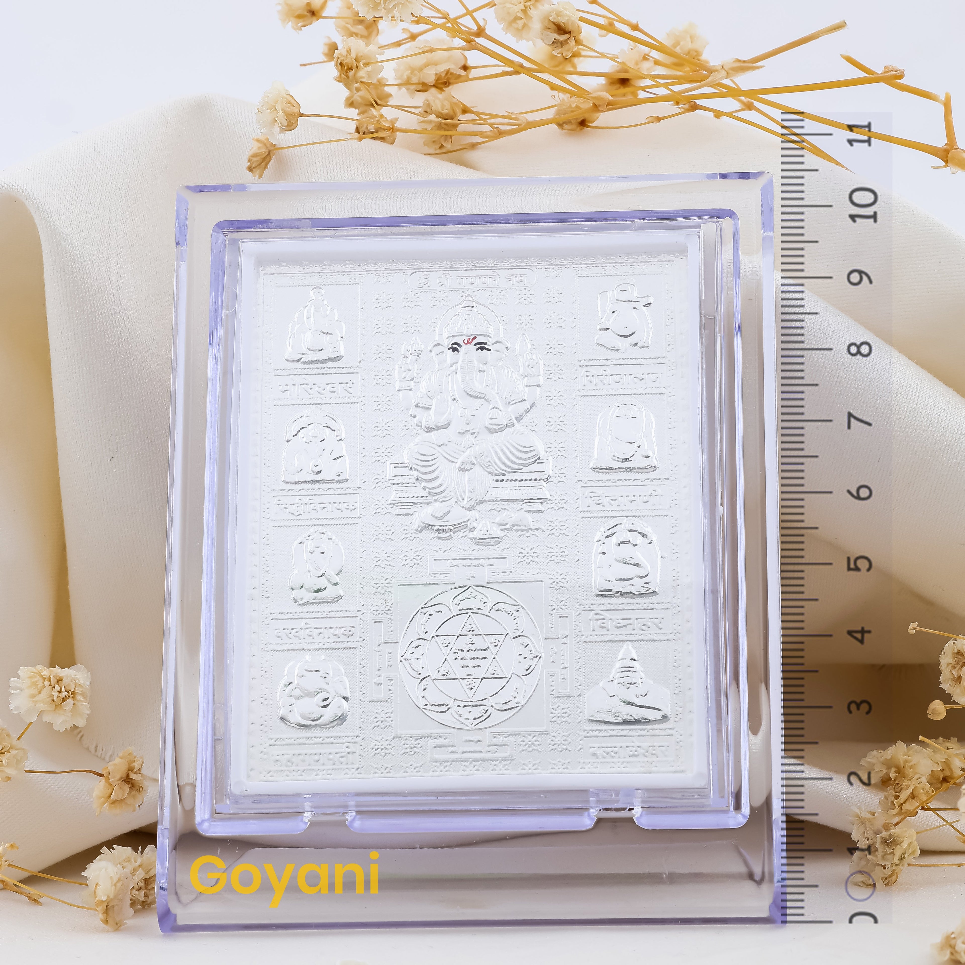 Close-up of the 10.5 cm 999 silver Ganesha with Yantra stand, showing the high-polish finish and intricate design.