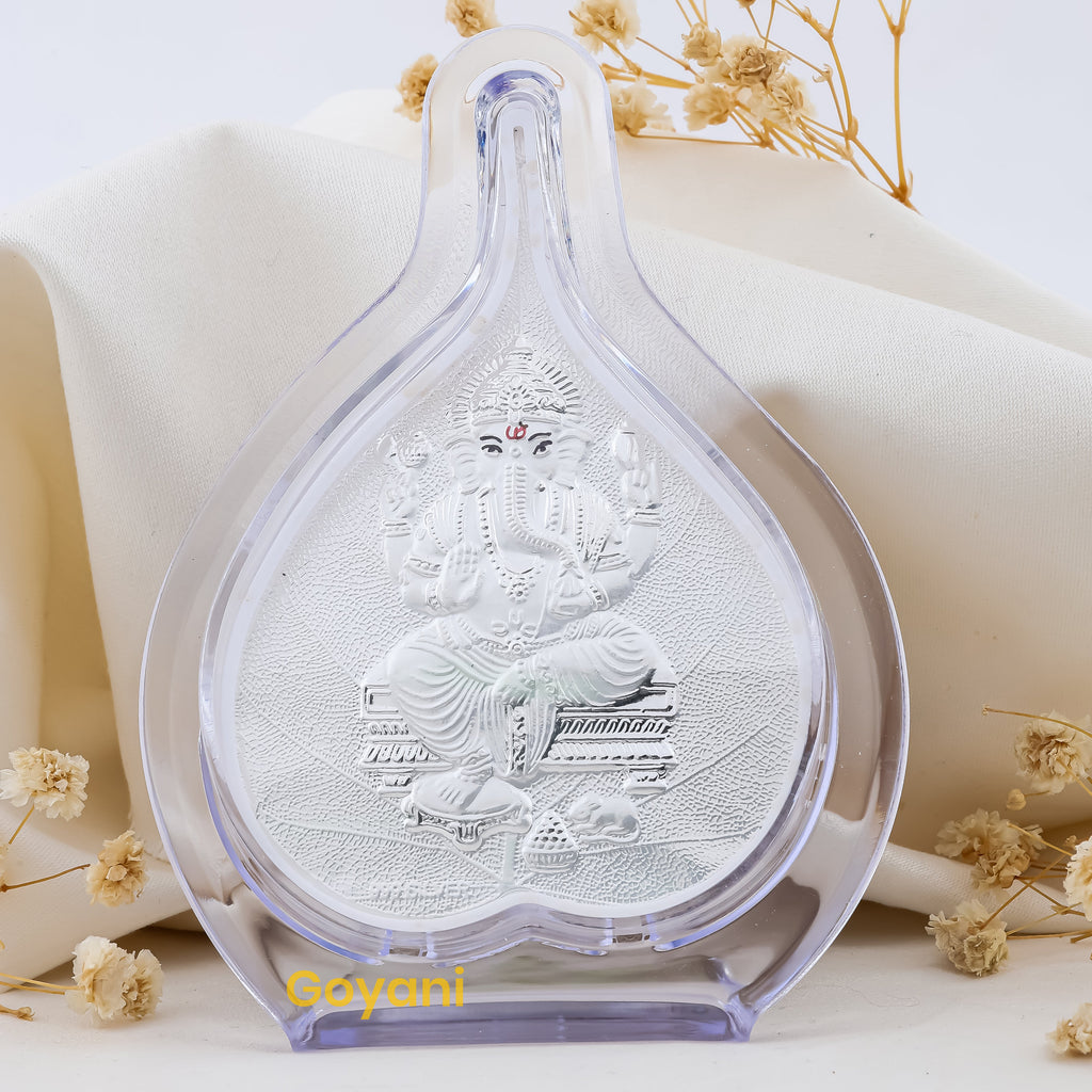 Front view of a 999 pure silver Ganesha Pan Stand showing Lord Ganesha seated on a high-polished pan leaf.