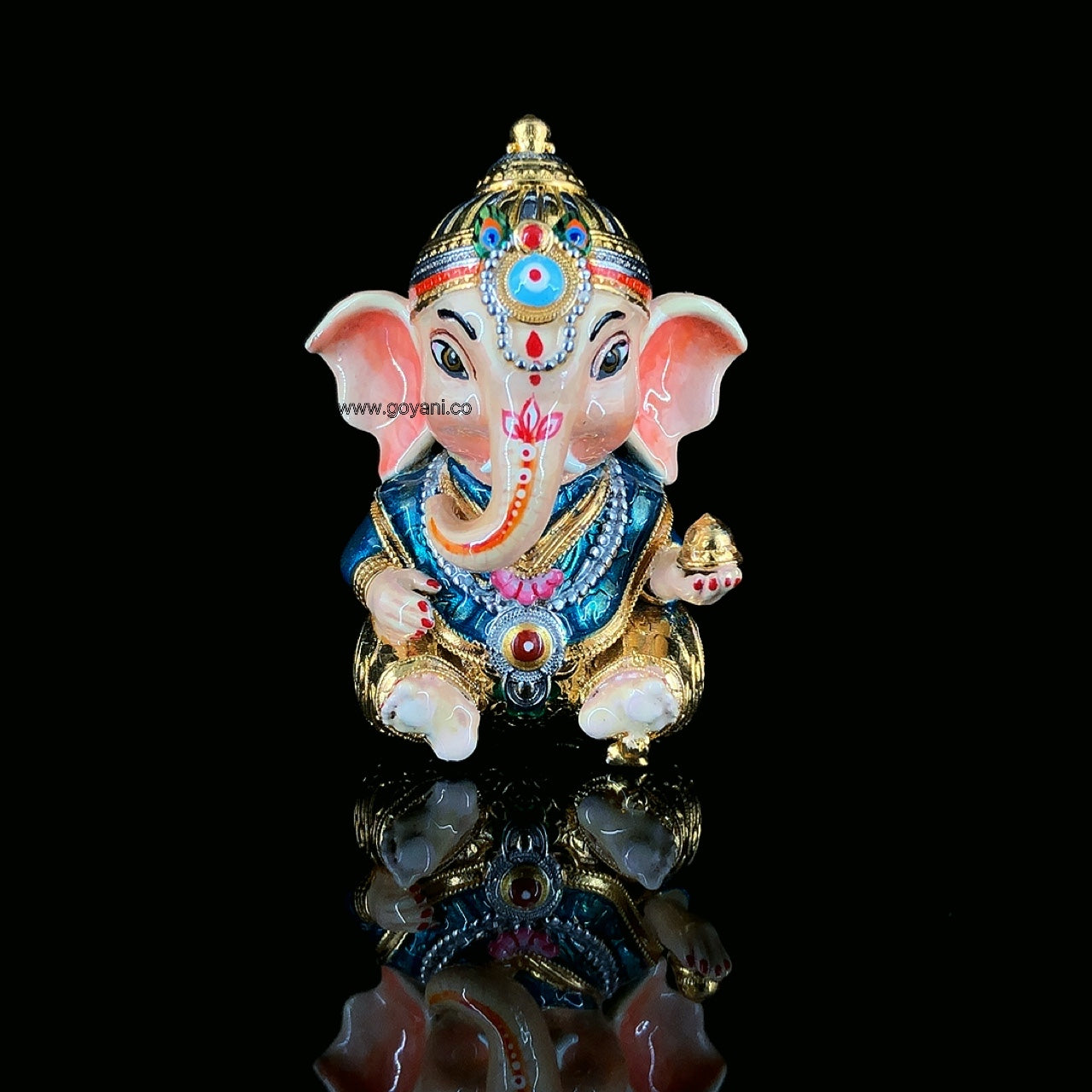 Front view of the 925 silver Baal Ganesha murti, highlighting the colorful Meena enamel on the crown and attire. Main image