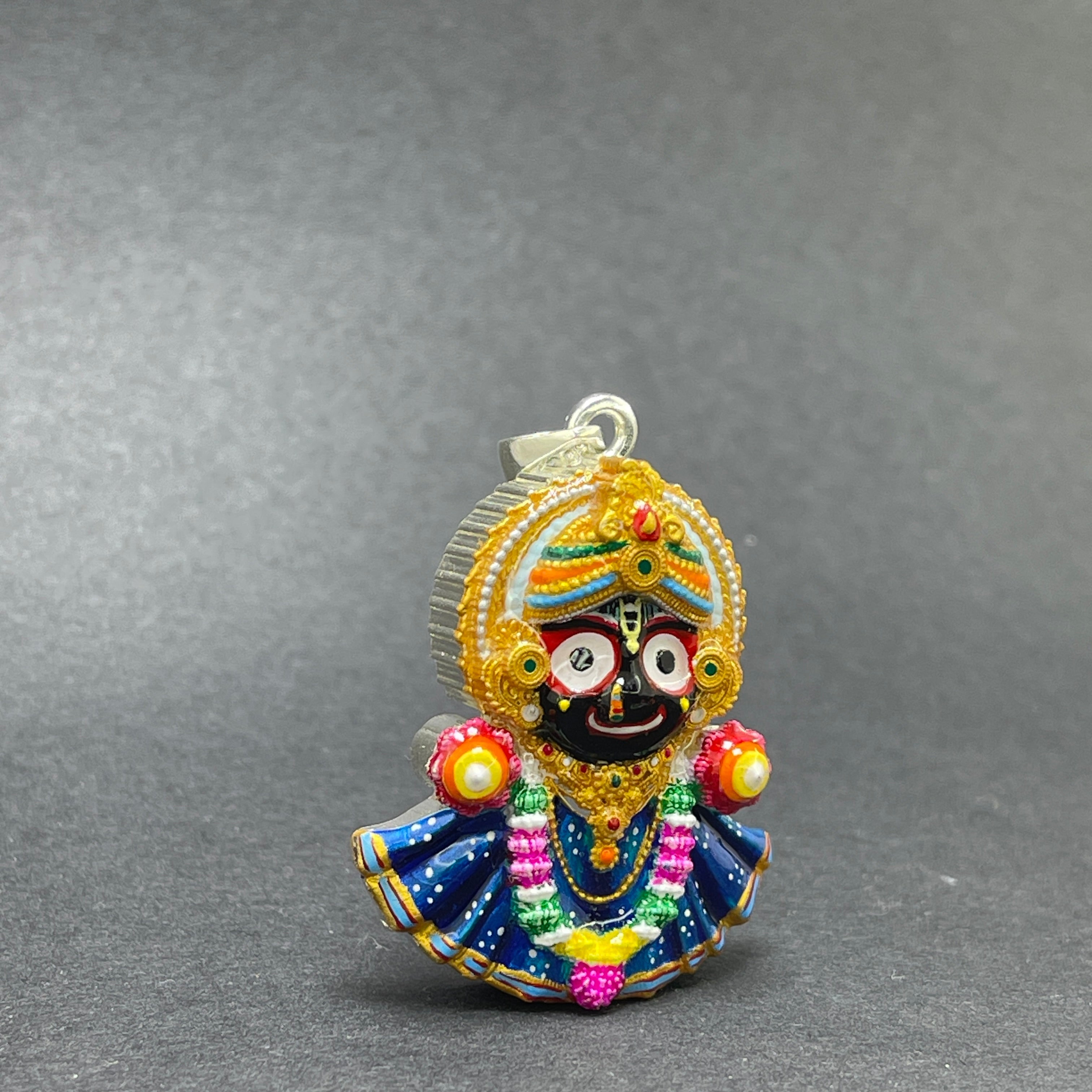 A colorful 925 silver Jagannath pendant showing detailed hand-painted enamel on the deity's face.