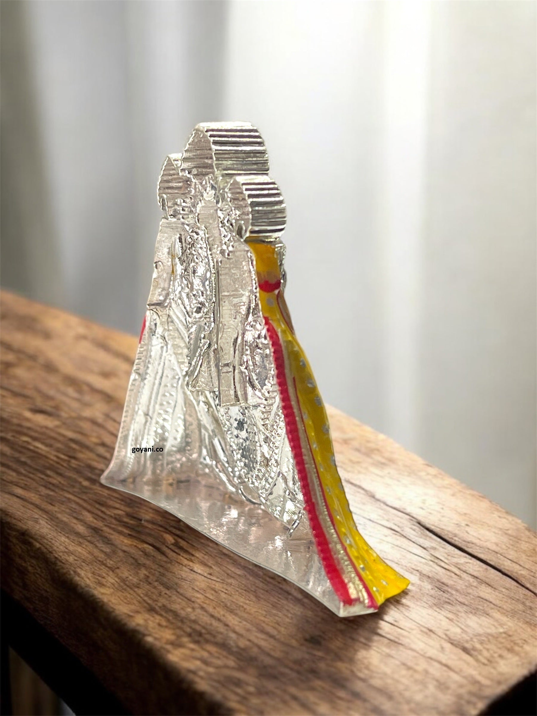 The 925 silver Bagalamukhi Mata idol on a plain background to show its true size and brilliant sterling finish.