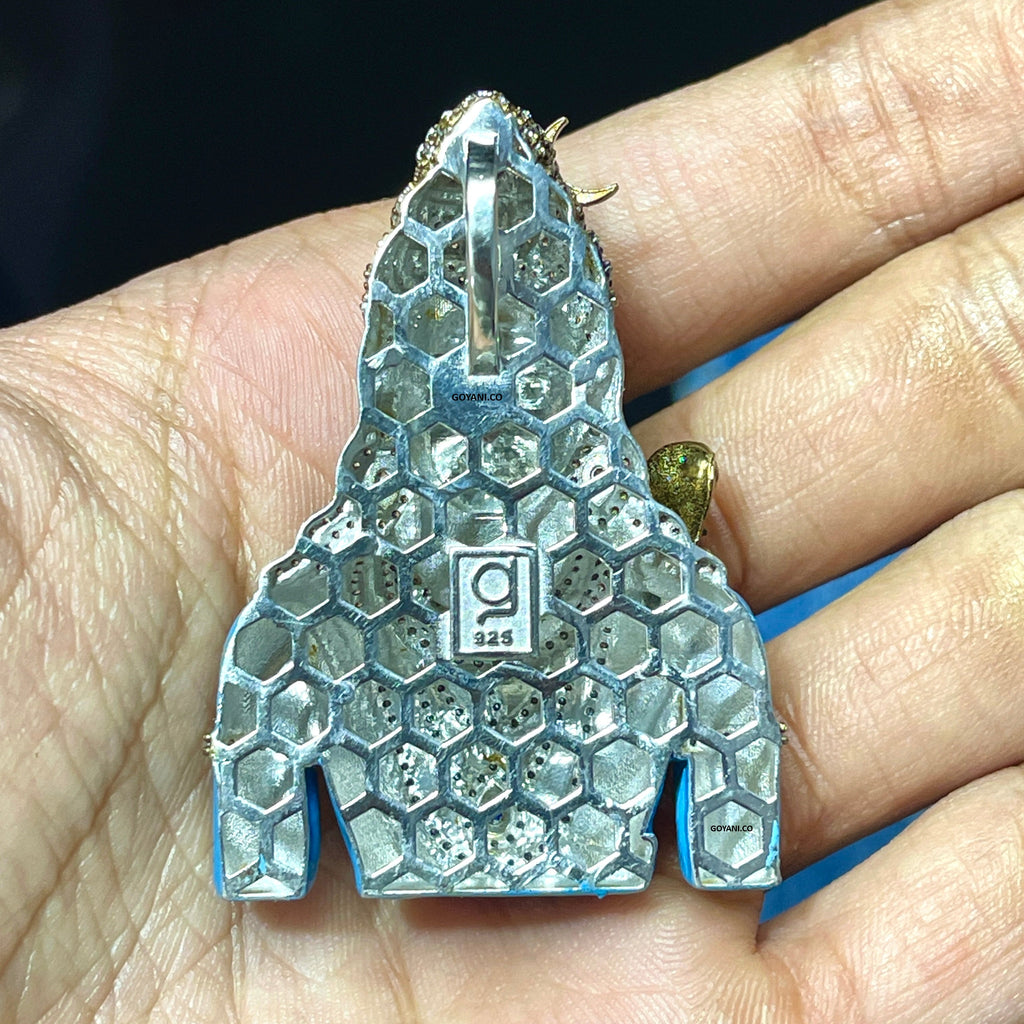 Angled side view of the 925 Silver Shiva Pendant, showing the depth of the design and the shimmer of the stones.