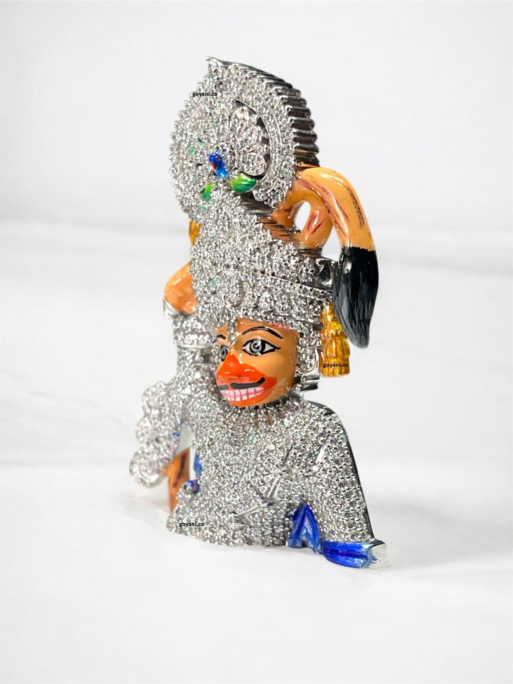 Angled side profile of the Salangpur Hanumanji pendant in 925 silver, highlighting the intricate diamond setting.