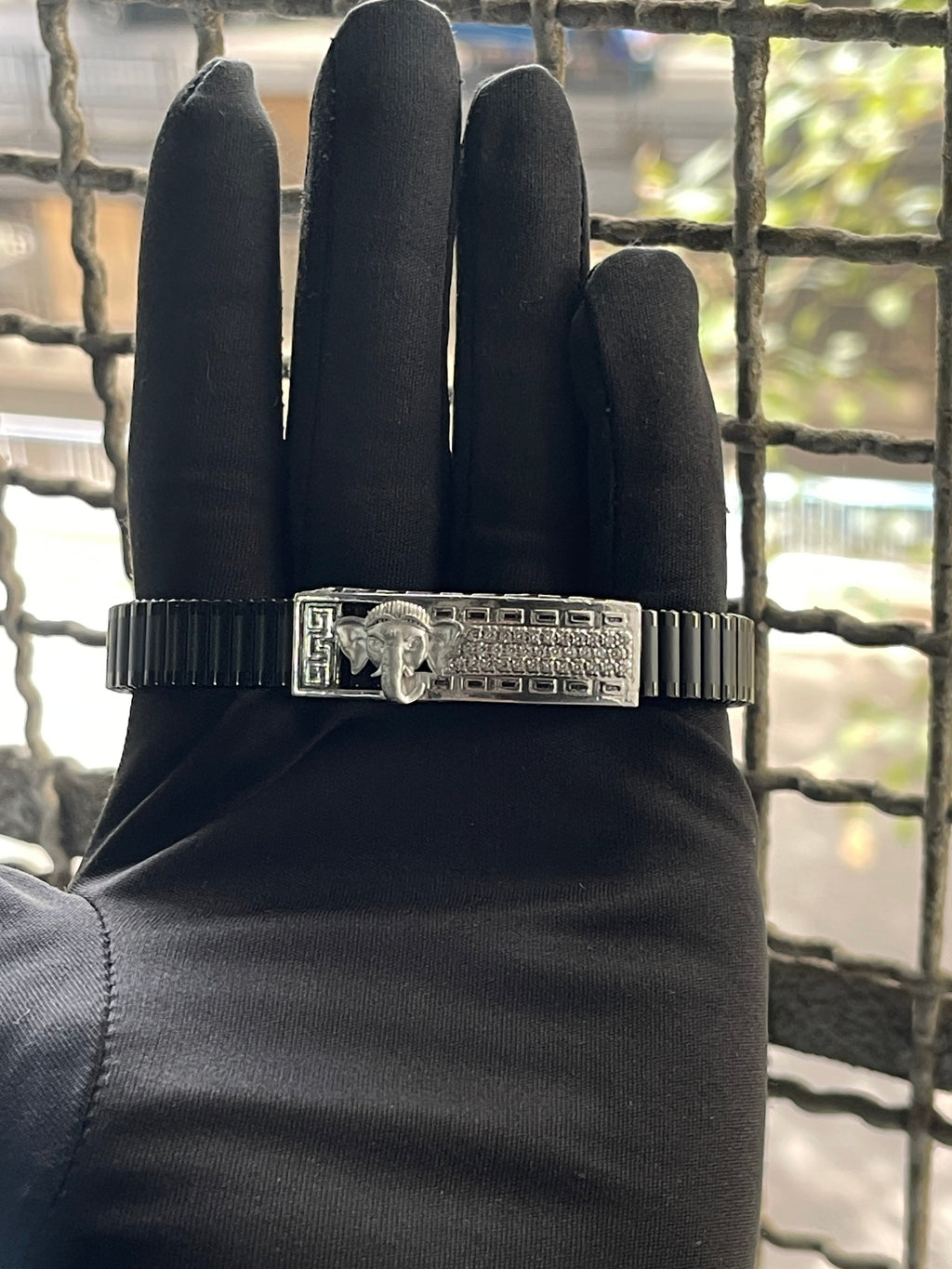 A detailed close-up of the 925 silver Ganesha bracelet, showing the intricate Ganpati carving and sparkling CZ stones.
