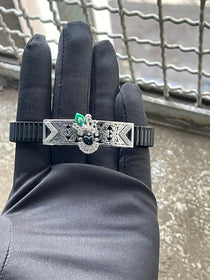 The 925 Silver Shrinathji Bracelet worn on a wrist, displaying its adjustable stainless steel spring belt kada design.