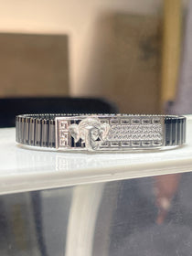 Front view of the Lord Ganesha bracelet for men, showcasing the detailed Ganpati design in 925 silver on a black kada.