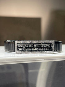 A 925 silver Hanuman Chalisa bracelet for men with a black kada strap, displayed on a neutral background.