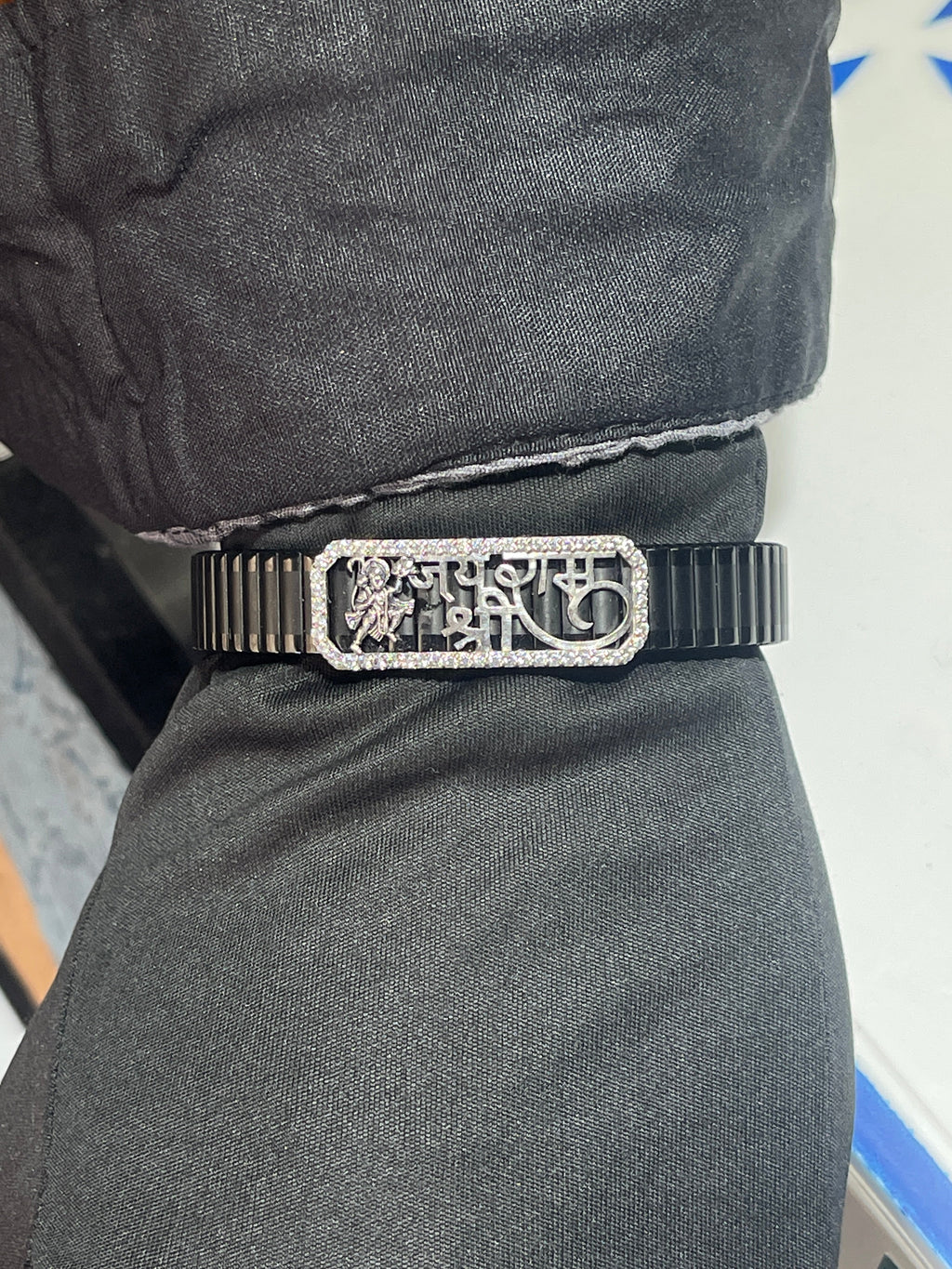 A man wearing the rhodium-polished 925 Silver Hanuman Ji Bracelet, highlighting its comfortable fit on the wrist.