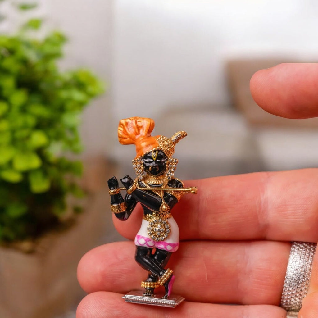 A full front view of the 925 silver Radha Raman idol showcasing the detailed Meenakari and diamond work for home puja.