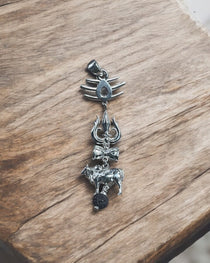 Detailed craftsmanship of the Nandi bull and Damru on the spiritual 925 silver Shiva Mahadev pendant.