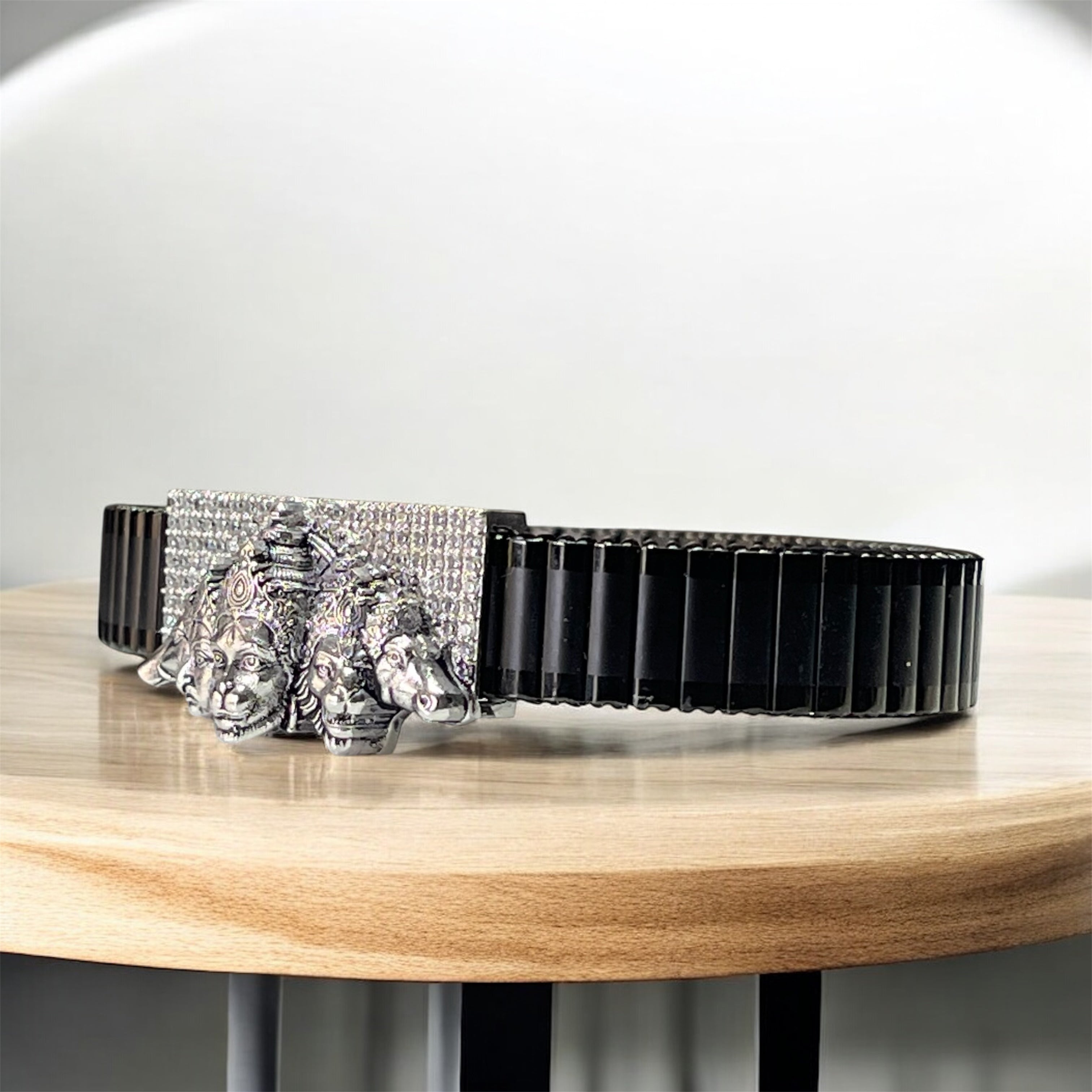 Close-up detail of the handcrafted 925 silver Panchmukhi Hanuman centerpiece and stones.