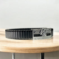 Close-up of the 925 sterling silver Meldi Maa idol centerpiece showing intricate carving and premium shine.