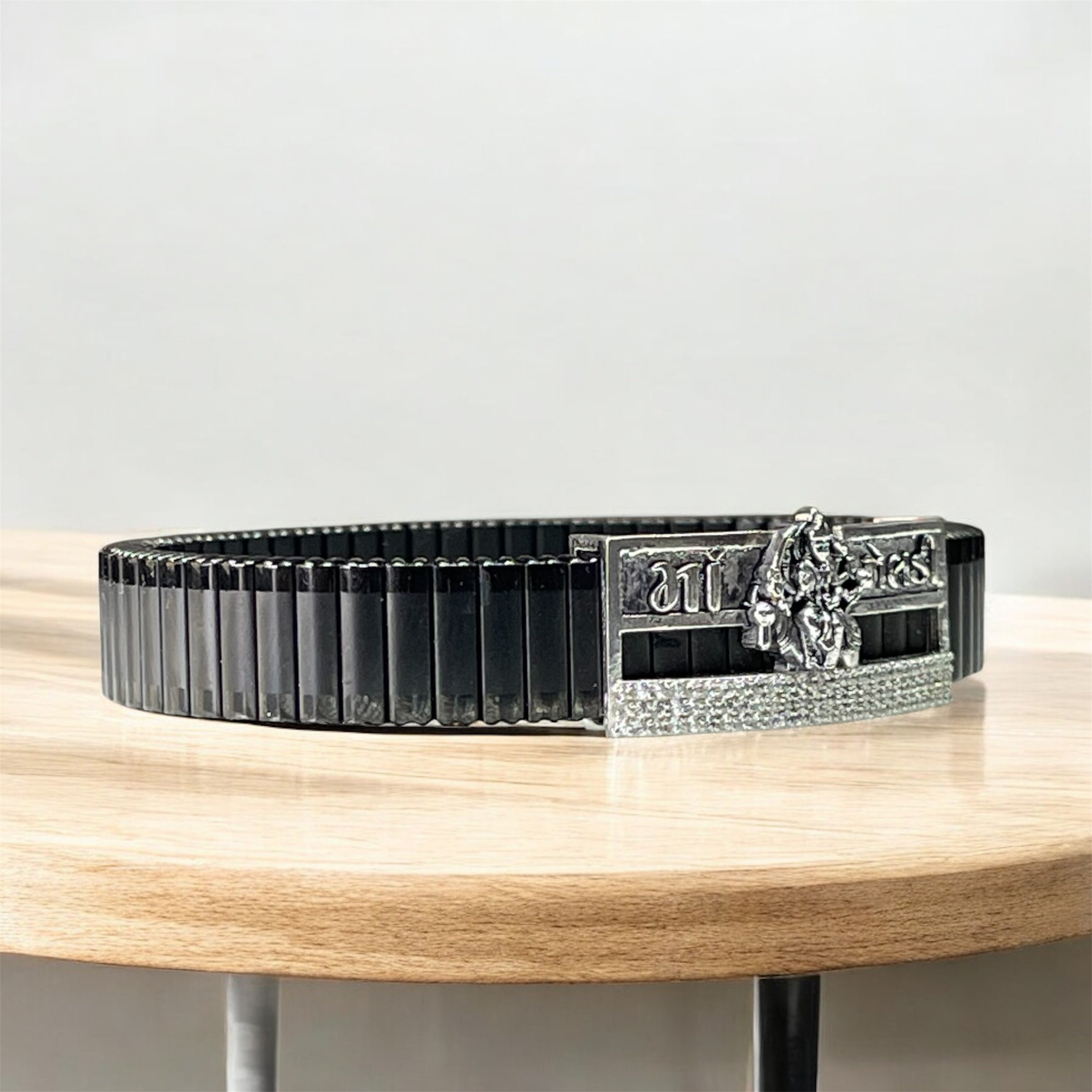 Close-up of the 925 sterling silver Meldi Maa idol centerpiece showing intricate carving and premium shine.