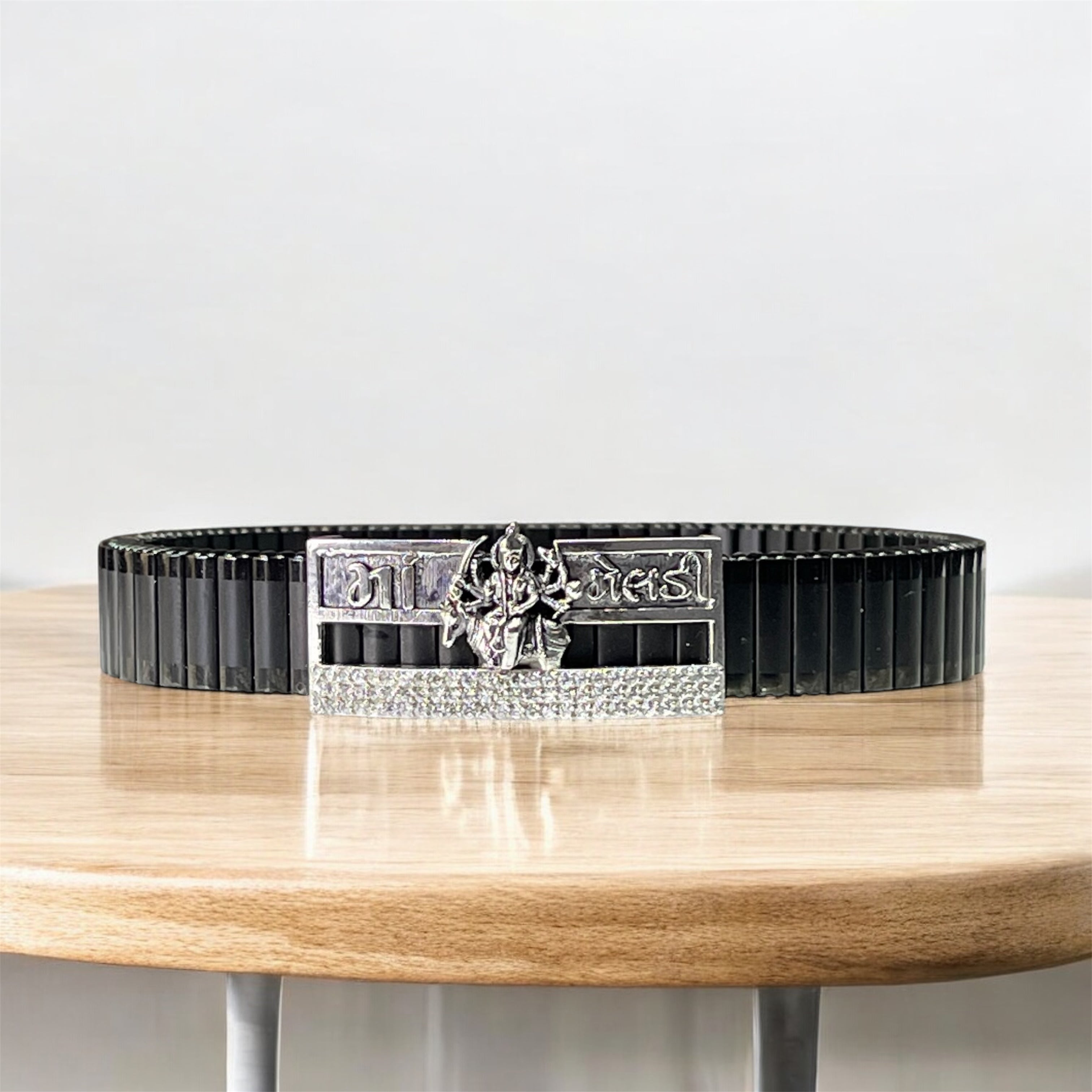 Front view of the 925 Silver Meldi Maa Bracelet with stone-studded detailing on a black stainless steel strap. Main image