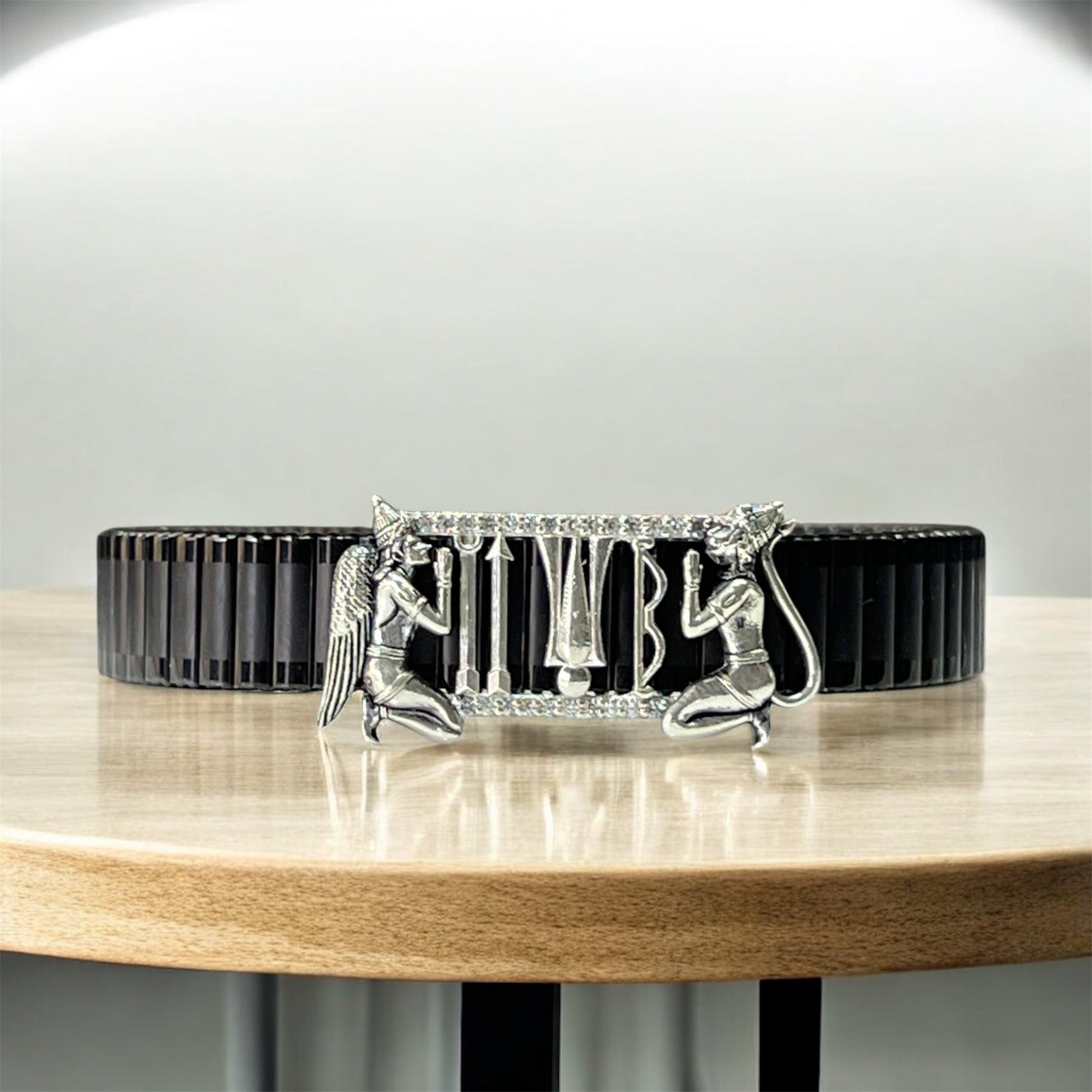 Front view of the 925 Silver Tirupati Balaji Tilak Bracelet on a black stainless-steel strap. Main image