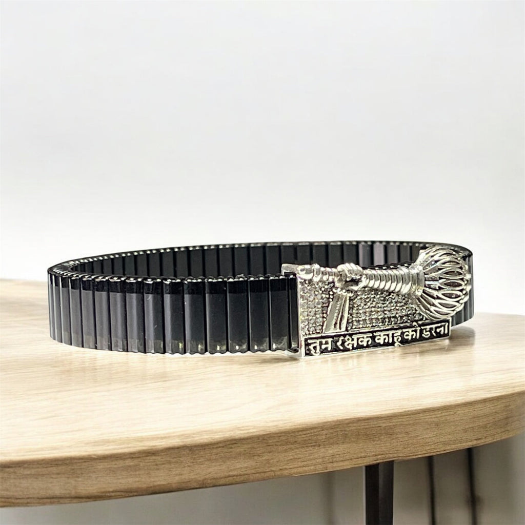 Side profile worn look of the 925 silver Hanuman gada bracelet with a secure fold-over clasp design.