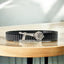 Front view of the 925 Silver Hanuman Gada Bracelet featuring an engraved mantra on a black steel strap.