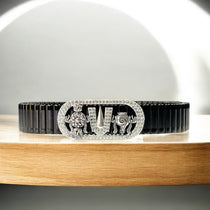 Front view of 925 Silver Tirupati Balaji Tilak Bracelet with sparkling iced Namam and black steel strap.