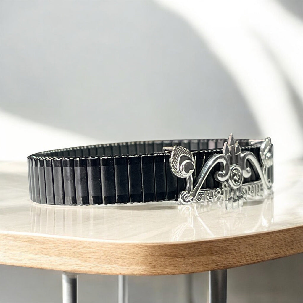 Close-up detail of the Dhanush and Tri-Baan motif on the 925 Silver Khatu Shyam Ji Bracelet.
