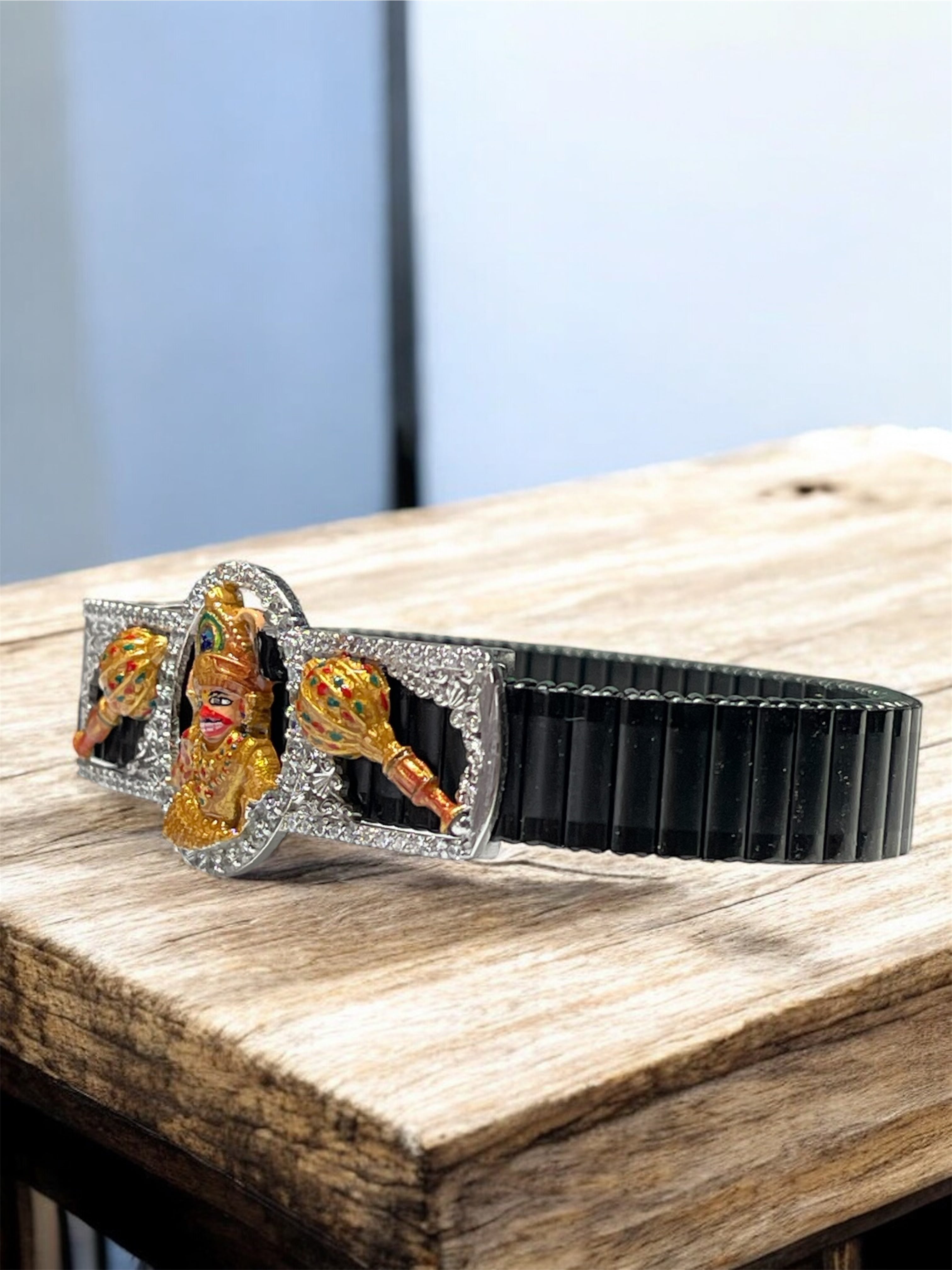 Side view of the 925 Silver Salangpur Hanumanji Bracelet highlighting the black stainless-steel strap.