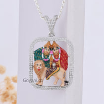 Angled shot of the Enamelled Chamudamaa 925 Silver Pendant, highlighting its 1.5-inch size and pure silver shine.
