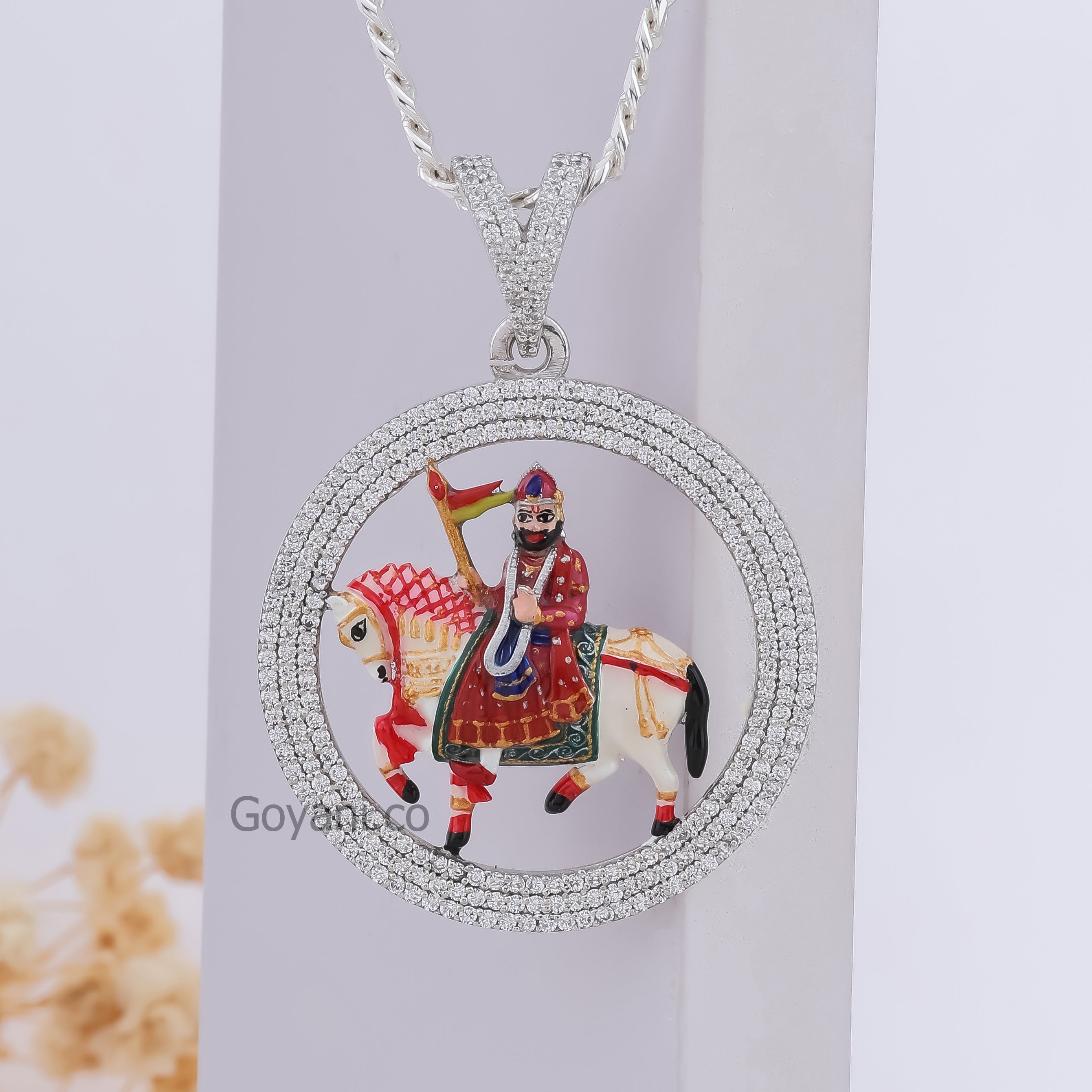 A detailed close-up of the Ramdev Pir 925 silver pendant, highlighting the intricate enamel and diamond setting.