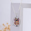 Front view of the Shrinathji Enamel 925 Silver Pendant, showcasing the detailed mina work and diamond accents.