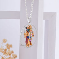 Angled side view of the 2-inch Panchmukhi Hanuman silver pendant, displaying its depth and handcrafted design.