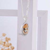 Angled view of the Bhurakhiya Hanuman pendant, showcasing the 35mm size and pure 925 silver craftsmanship.