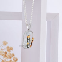 Angled view of the handcrafted Jalaram Bapa 925 silver pendant, showcasing its 35mm size and polished finish.