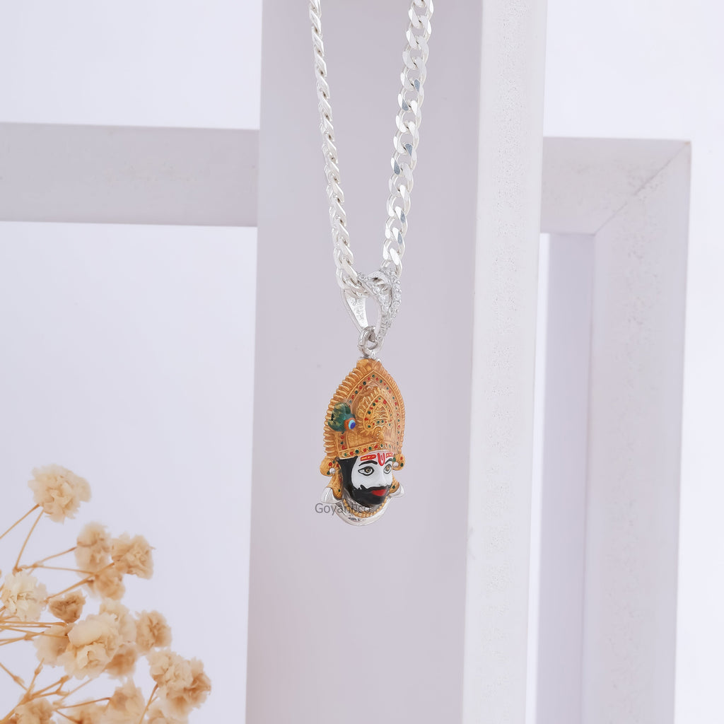 Khatu Shyam 925 silver enamel pendant shown from an angle to display its elegant 1-inch size and spiritual design.