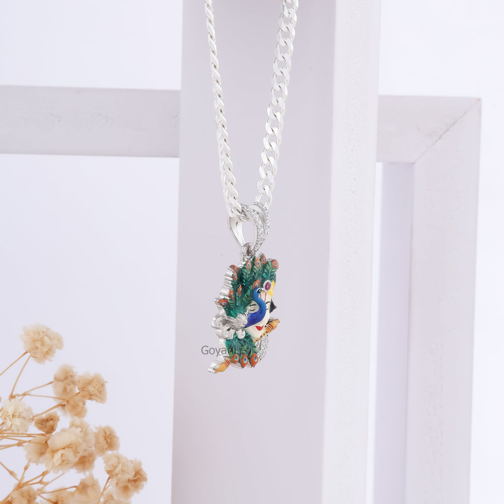 Angled view of the Krishna with Peacock Enamel Pendant in 925 silver, showcasing its lustrous finish and design.