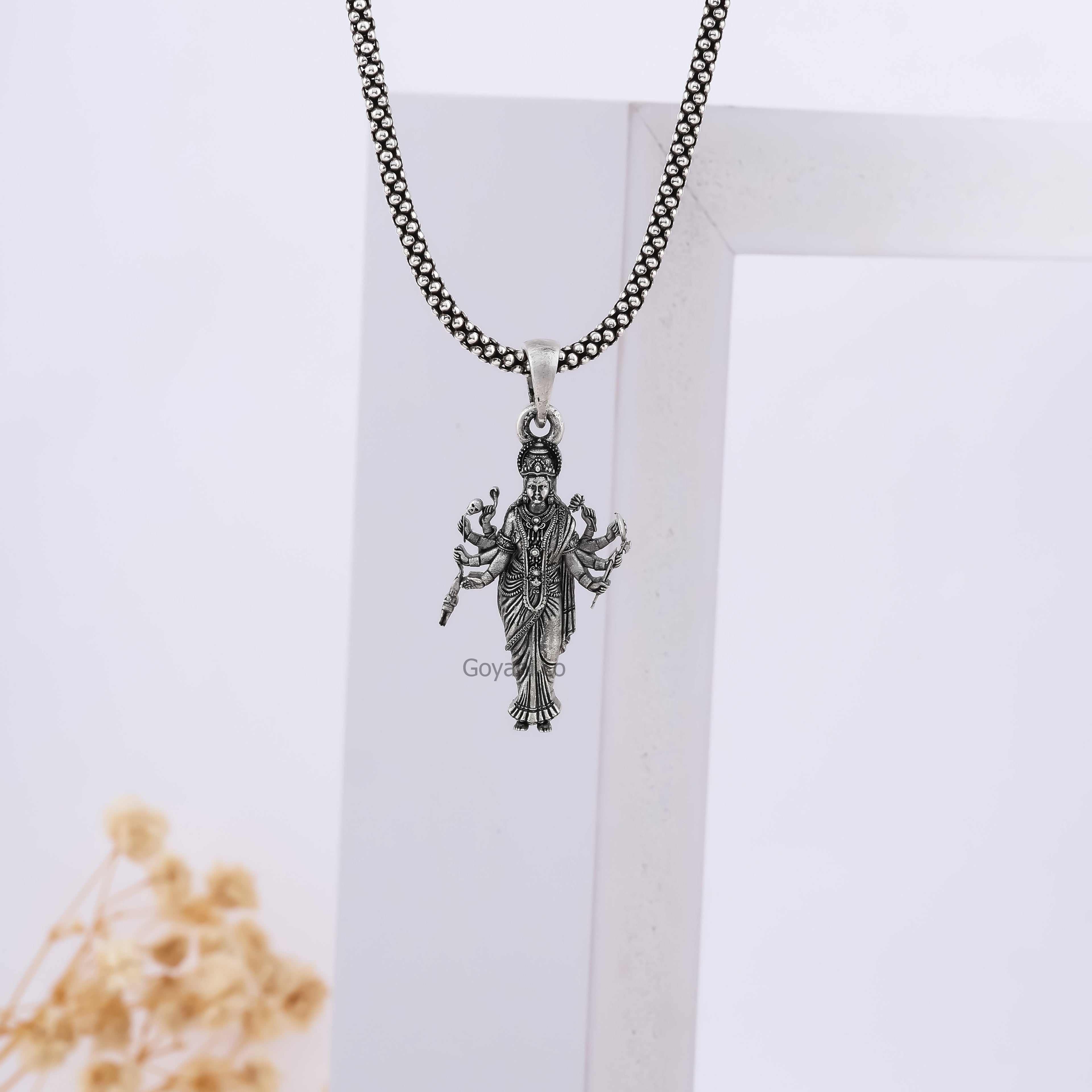 Premium Sadhi Maa pendant on display,