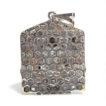 Side profile of the 925 silver temple-inspired Siddhivinayak Ganesh pendant displaying its silver base.